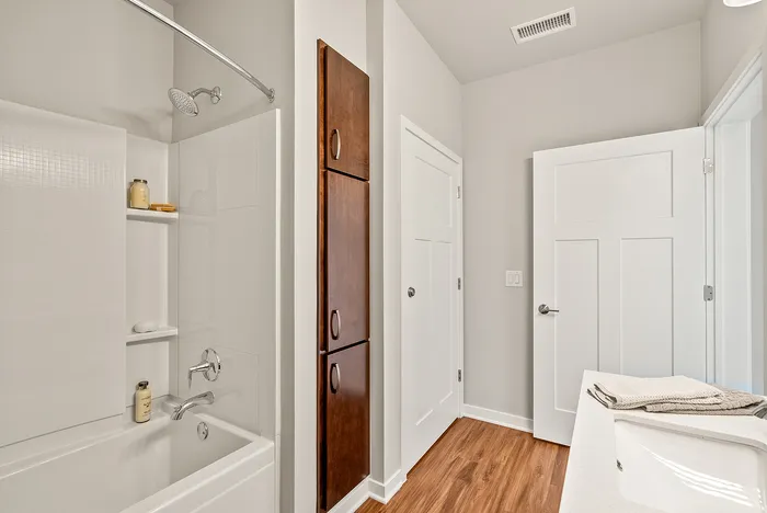Primary bathroom at Seasons at Orchard Hills in Oak Creek, Wisconsin, featuring clean finishes and practical layout.