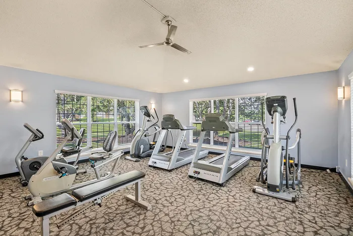 Fitness center at Riverwood Apartments in Kenosha, Wisconsin equipped for cardio and strength training.