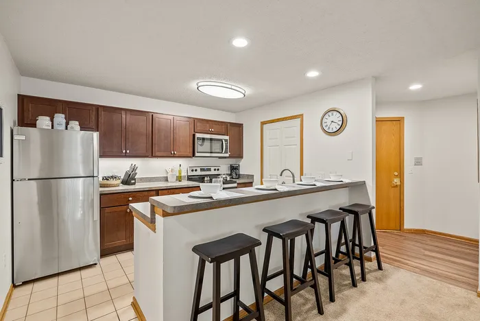 Apartment kitchen at Riverwood Apartments in Kenosha, Wisconsin featuring functional layouts and finishes.