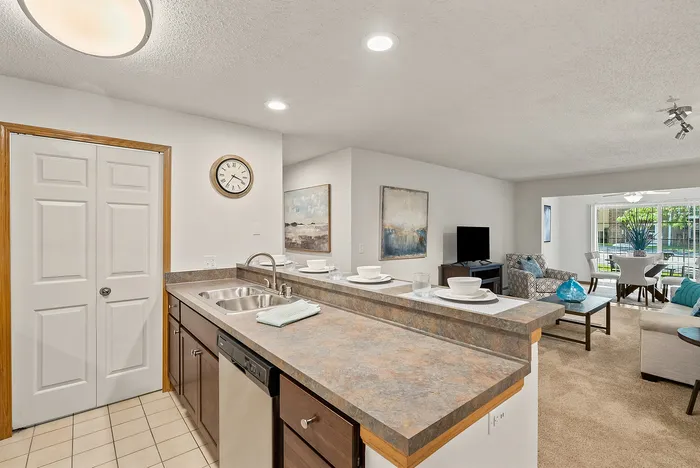 Apartment kitchen at Riverwood Apartments in Kenosha, Wisconsin featuring functional layouts and finishes.