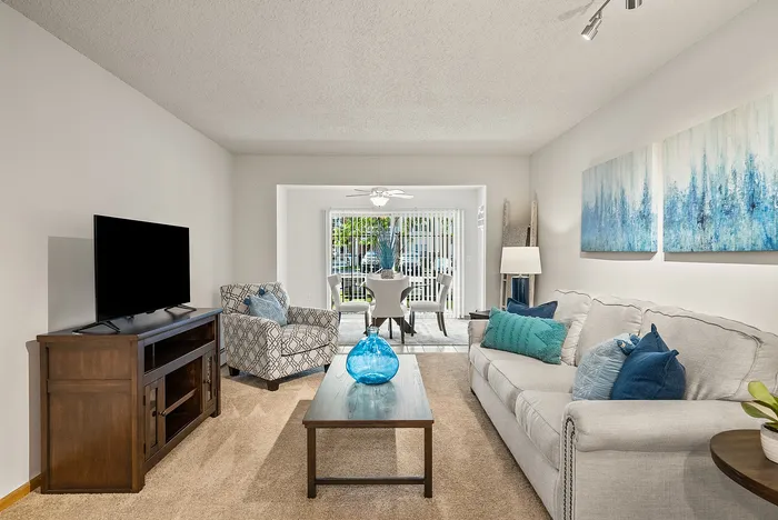 Living room at Riverwood Apartments in Kenosha, Wisconsin with comfortable layouts and natural light.