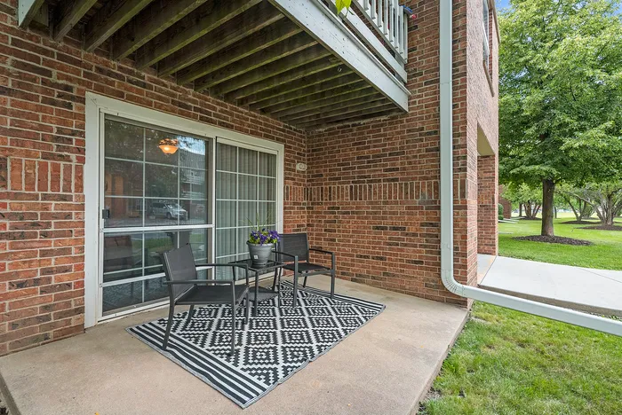Apartment patio at Riverwood Apartments in Kenosha, Wisconsin providing outdoor living space.