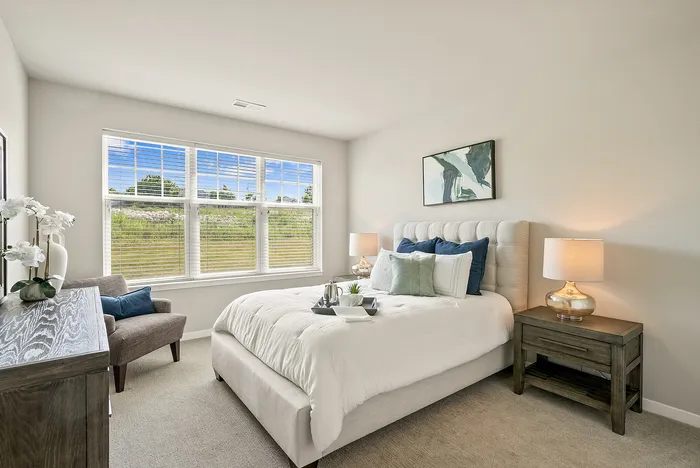Living room at Drexel Ridge Apartments in Oak Creek, Wisconsin with open layouts and natural light.