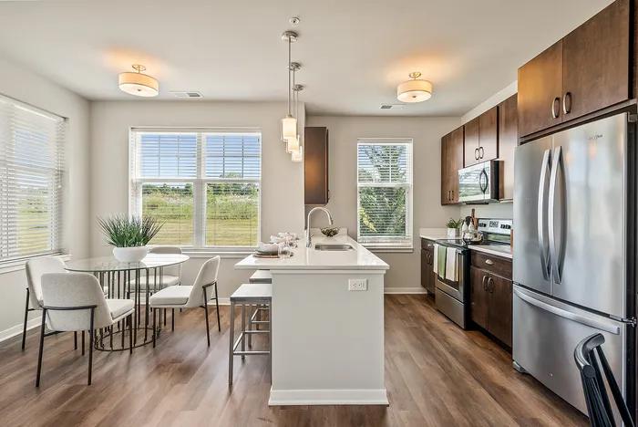 Apartment kitchen at Drexel Ridge Apartments in Oak Creek, Wisconsin featuring modern finishes and layouts.