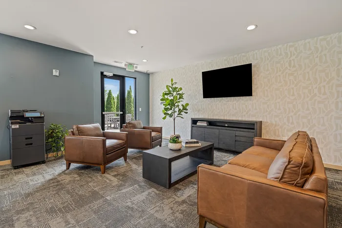 Resident lounge at The Woodlands at North Hills designed for relaxing or gathering.