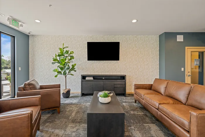 Resident lounge at The Woodlands at North Hills designed for relaxing or gathering.