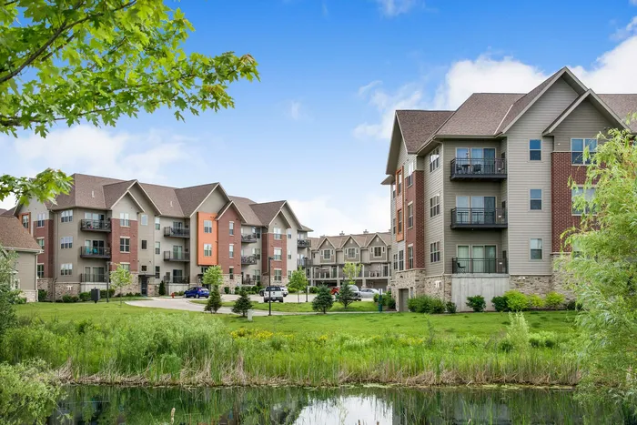 The Woodlands at North Hills Apartments in Menomonee Falls, WI, offering 1 bedroom, 1 bedroom + den, and 2 bedroom apartment homes.