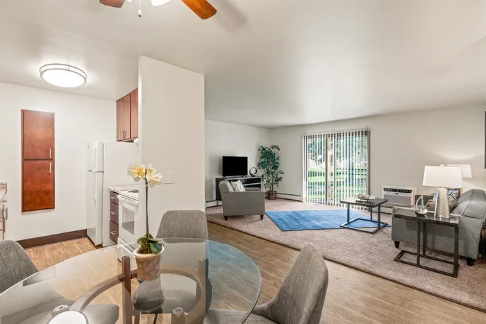 Dining room area at Fitchburg Square Apartments in Fitchburg, Wisconsin, offering comfortable space for everyday meals within 1 bedroom and 2 bedroom apartments.