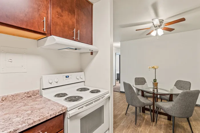 Kitchen interior at Fitchburg Square Apartments in Fitchburg, Wisconsin, featuring functional layouts designed for 1 bedroom and 2 bedroom apartment homes.
