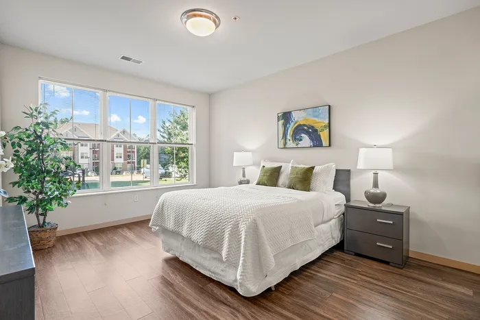 Bedroom at Elan Apartments in Fitchburg, Wisconsin designed for comfort and privacy.