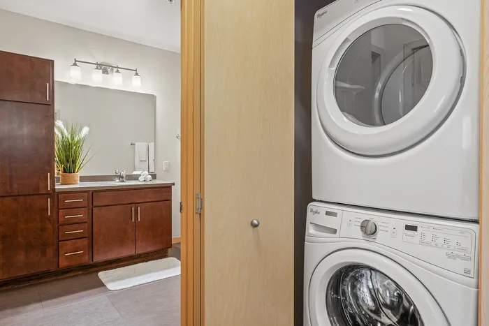 In-unit washer and dryer at Elan Apartments in Fitchburg, Wisconsin providing convenient laundry access.