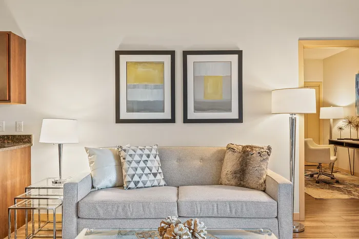 Living room at Elan Apartments in Fitchburg, Wisconsin showcasing open layouts and natural light.