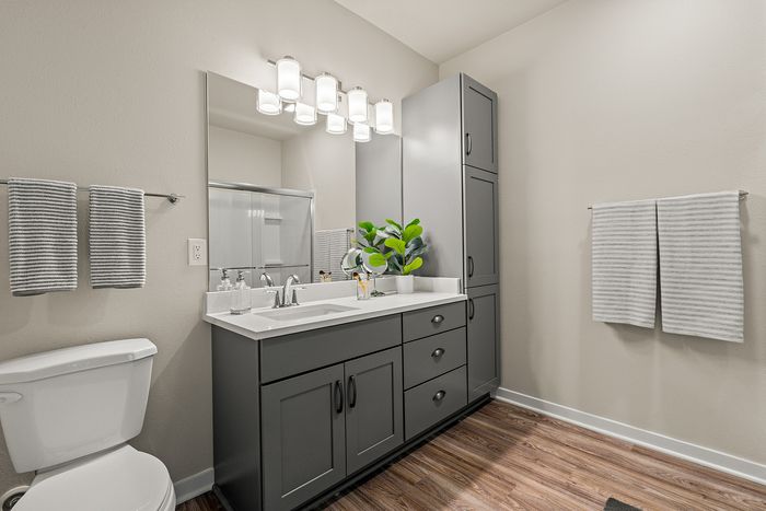 Bathroom at Seasons at Franklin Apartments in Franklin, Wisconsin featuring clean finishes and functional vanity space.