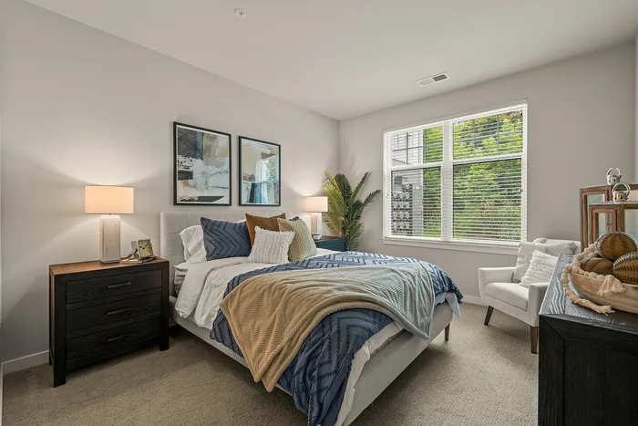 Bedroom at Seasons at Franklin Apartments in Franklin, Wisconsin providing comfortable space with flexible furniture layouts