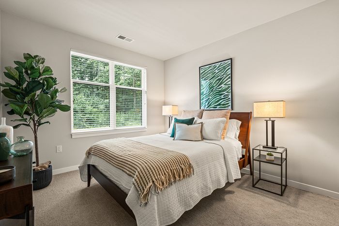 Bedroom at Seasons at Franklin Apartments in Franklin, Wisconsin providing comfortable space with flexible furniture layouts
