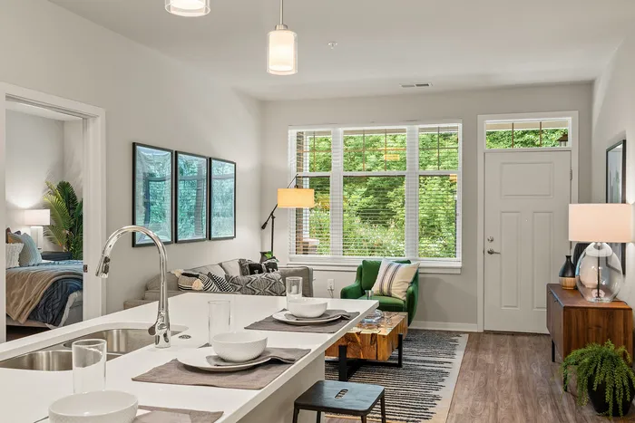 Kitchen at Seasons at Franklin Apartments in Franklin, Wisconsin featuring ample cabinet storage, updated appliances, and functional layout.