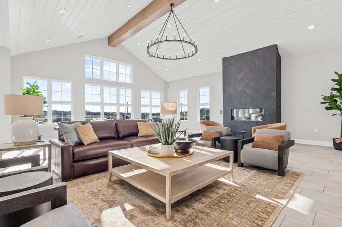 Modern clubhouse interior with lounge and kitchen space at Apex at Verona in Verona, WI