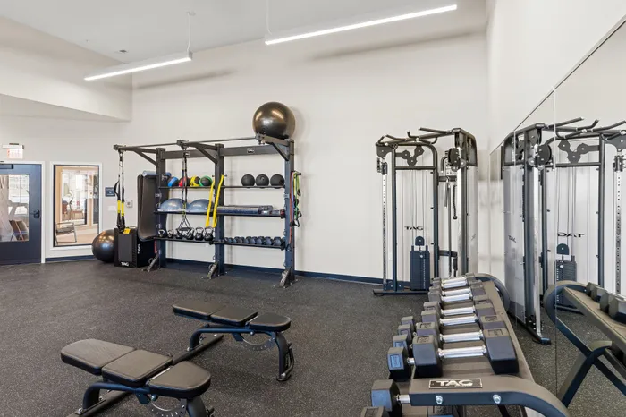 Fully equipped fitness center with modern equipment at Apex at Verona in Verona, WI