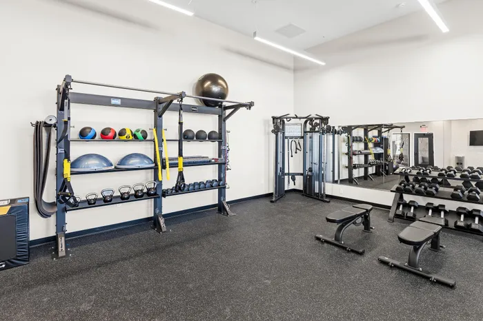 Fully equipped fitness center with modern equipment at Apex at Verona in Verona, WI
