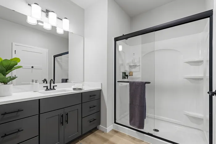 Modern apartment bathroom with contemporary finishes at Apex at Verona in Verona, WI
