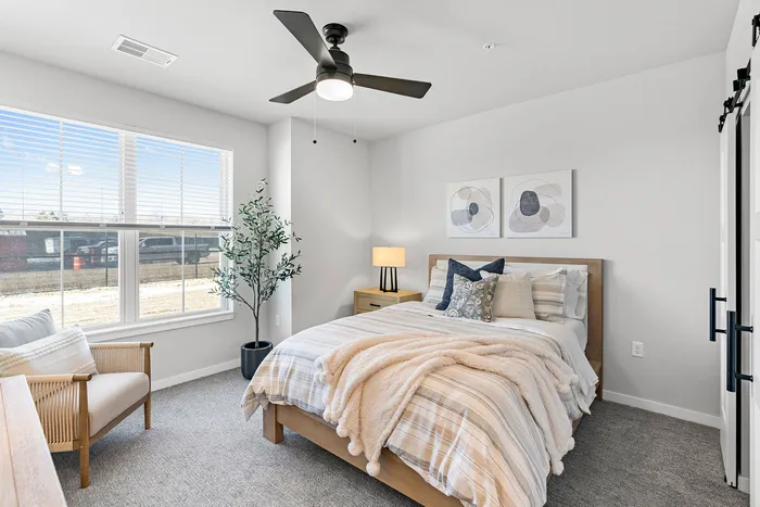Modern apartment bedroom with contemporary finishes at Apex at Verona in Verona, WI