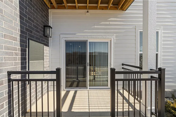Private patio with outdoor living space at Apex at Verona apartments in Verona, WI