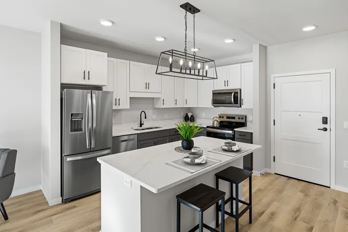 Modern apartment kitchen with contemporary finishes at Apex at Verona in Verona, WI