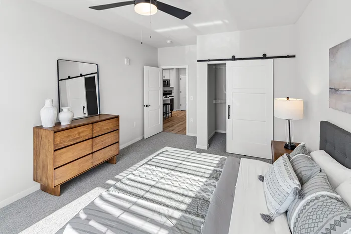 Modern model apartment bedroom with contemporary finishes at Apex at Verona in Verona, WI.