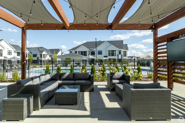 Outdoor pergola lounge area at Seasons at Elgin Apartments in Elgin, Illinois.