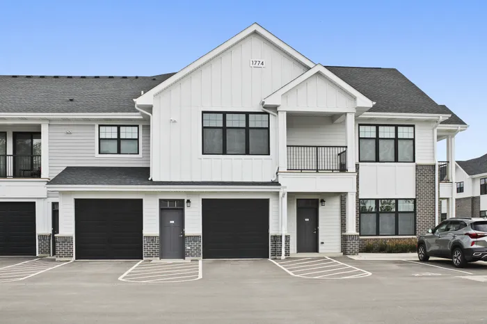 Exterior view of resident apartment buildings at Seasons at Elgin Apartments in Elgin, Illinois.