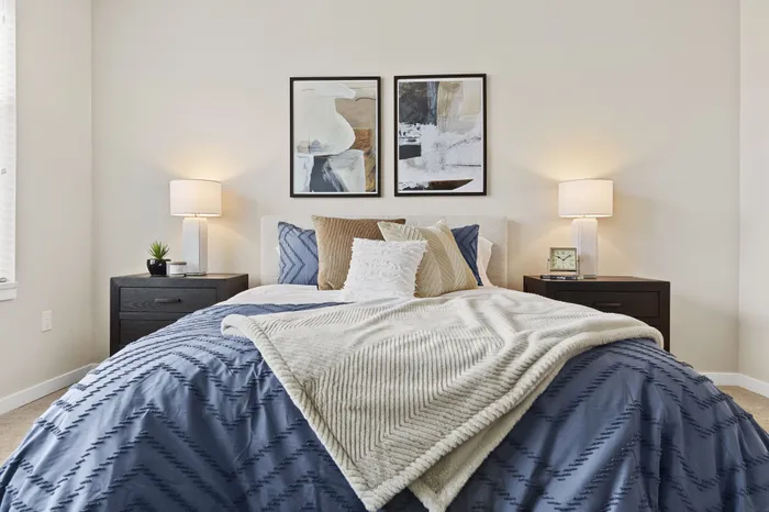 Bedroom at Seasons at Elgin Apartments in Elgin, Illinois offering generous space and natural light.
