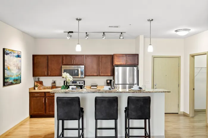 Kitchen at The Woodlands at North Hills featuring functional layouts and ample cabinet space.