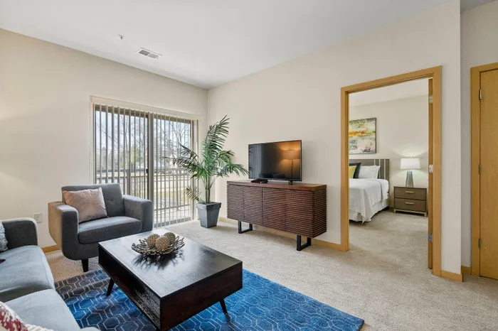 Living room at The Woodlands at North Hills with open layouts and space for everyday living.
