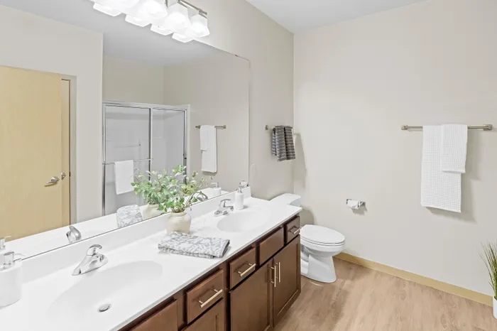 Apartments in Menomonee Falls, Wisconsin. The Woodlands at North Hills offers spacious 1 bedroom, 1 bedroom + den, and 2 bedroom apartments.