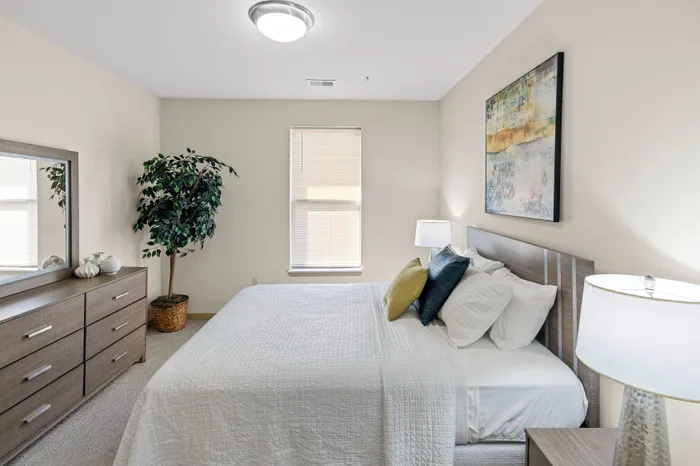 Bedroom at The Woodlands at North Hills offering generous space and comfortable layouts.