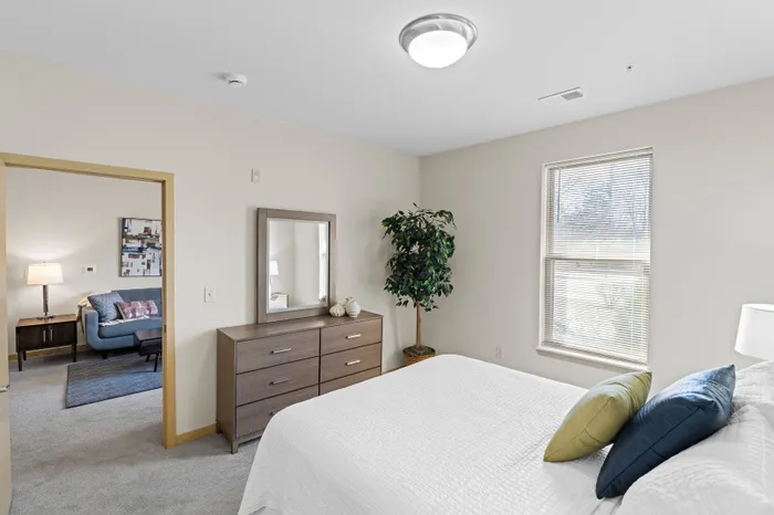 Bedroom at The Woodlands at North Hills offering generous space and comfortable layouts.