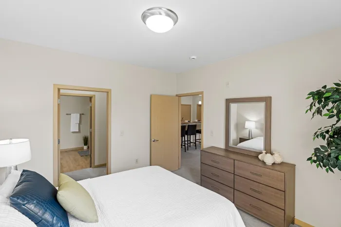 Bedroom at The Woodlands at North Hills offering generous space and comfortable layouts.