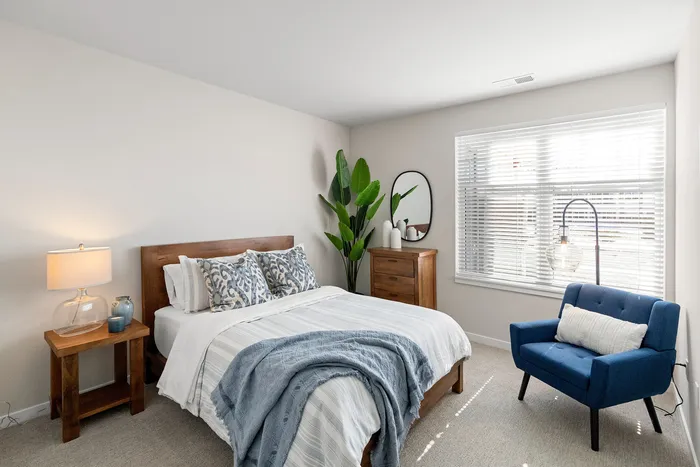 Bedroom at Seasons at Grafton Apartments in Grafton, Wisconsin providing comfortable space for everyday living.