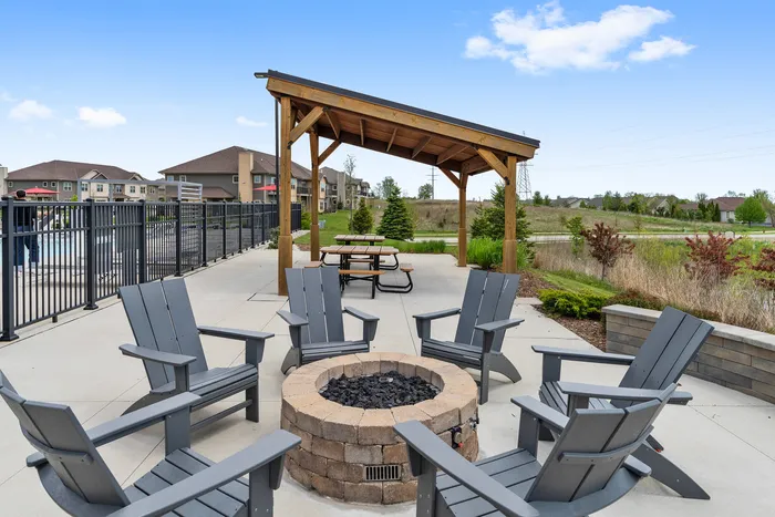 Outdoor fire pit at High Bluff Townhomes in Grafton, Wisconsin for resident gatherings and socializing.
