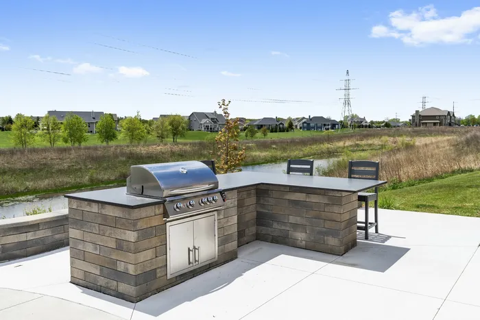 Outdoor grill station at High Bluff Townhomes in Grafton, Wisconsin for resident use.