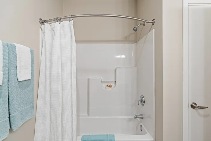 Bathroom at High Bluff Townhomes in Grafton, Wisconsin with modern fixtures and finishes.