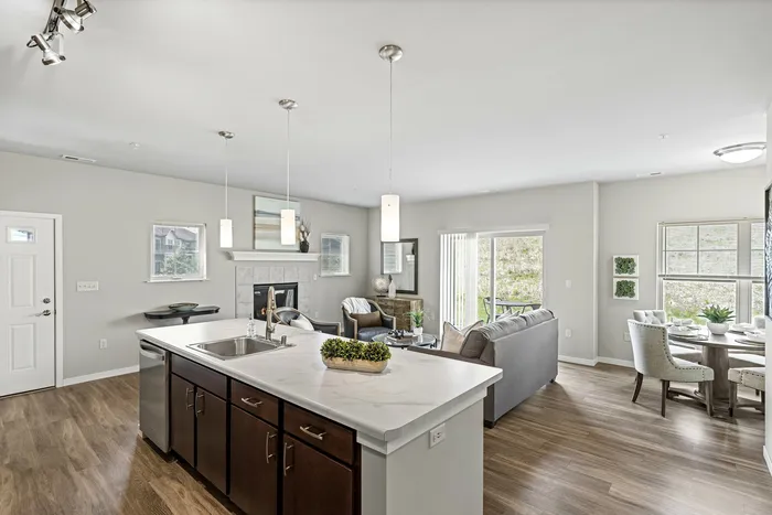 Apartment kitchen at High Bluff Townhomes in Grafton, Wisconsin featuring modern finishes and layouts.