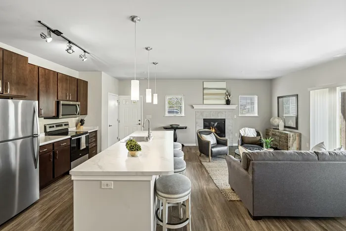 Apartment kitchen at High Bluff Townhomes in Grafton, Wisconsin featuring modern finishes and layouts.