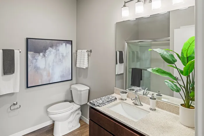 Bathroom at High Bluff Townhomes in Grafton, Wisconsin with modern fixtures and finishes.
