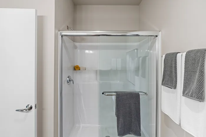 Bathroom at High Bluff Townhomes in Grafton, Wisconsin with modern fixtures and finishes.