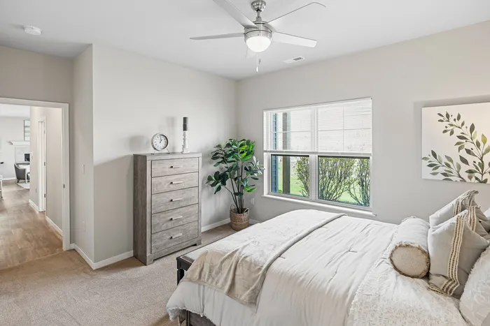 Bedroom at High Bluff Townhomes in Grafton, Wisconsin offering comfortable living space.