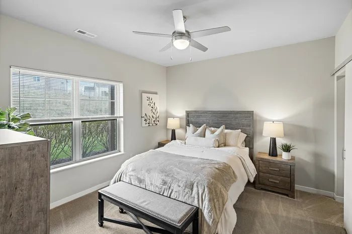 Bedroom at High Bluff Townhomes in Grafton, Wisconsin offering comfortable living space.