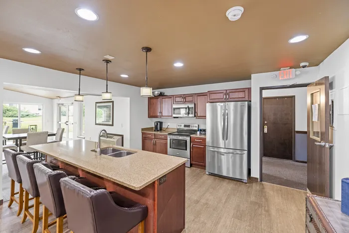 Community room at Arbor Lakes Apartments in Middleton, Wisconsin, designed for resident gatherings and events.