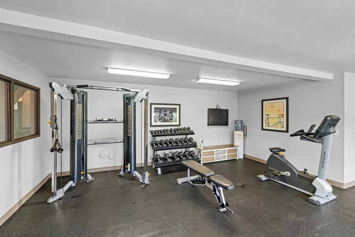Fitness center at Arbor Lakes Apartments in Middleton, Wisconsin, equipped for resident workouts.