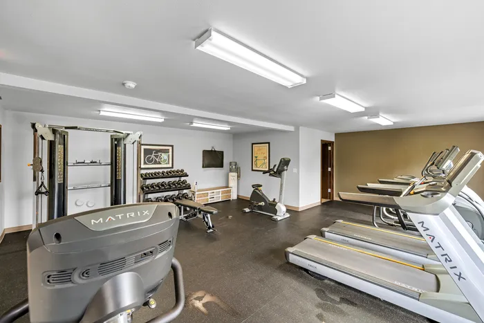 Fitness center at Arbor Lakes Apartments in Middleton, Wisconsin, equipped for resident workouts.